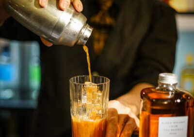 Men making a cocktail