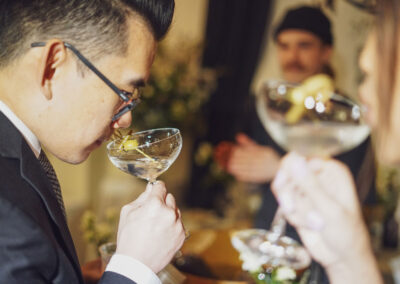 Image of man sampling cocktail